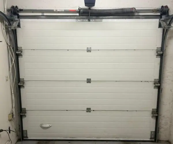 Ressorts ou câbles usés portes sectionnelles