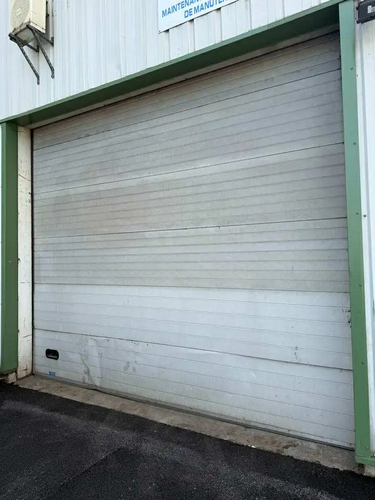 réparation de porte de garage sectionnelle Louveciennes