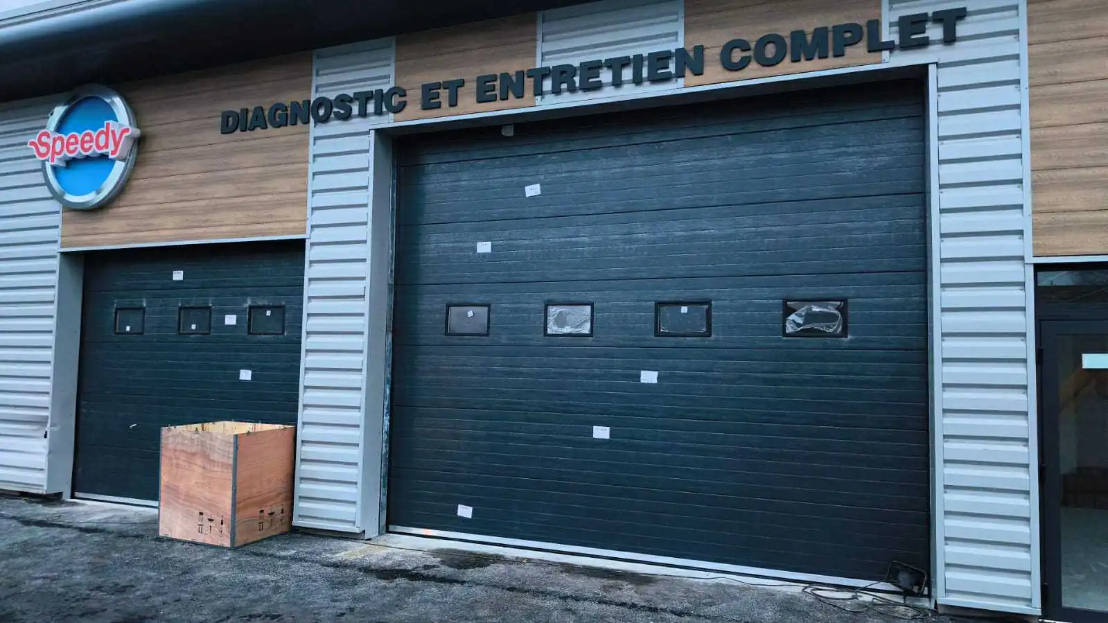 réparation porte de garage sectionnelle à Bois-d’Arcy