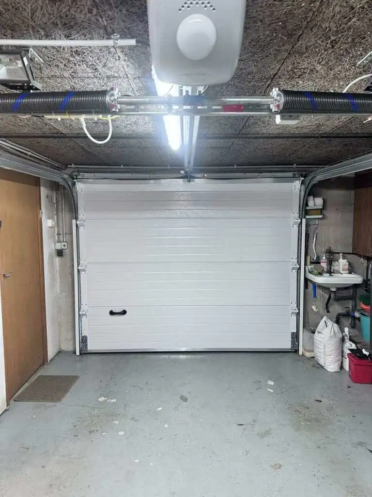 réparation de porte de garage sectionnelle Magnanville