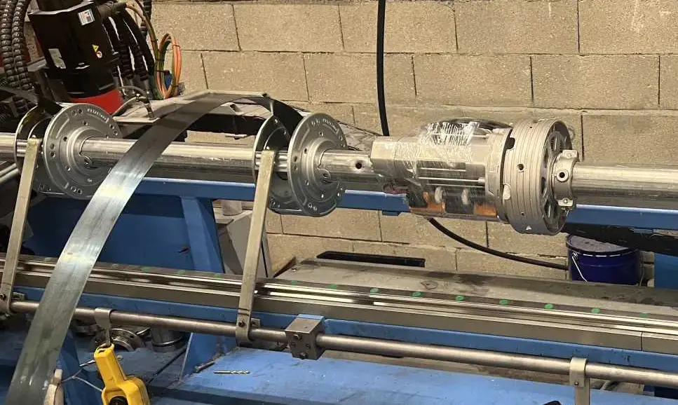 Comment retendre ressort rideau métallique 