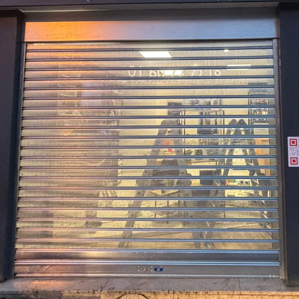 rideau métallique occasion à lames micro-perforées