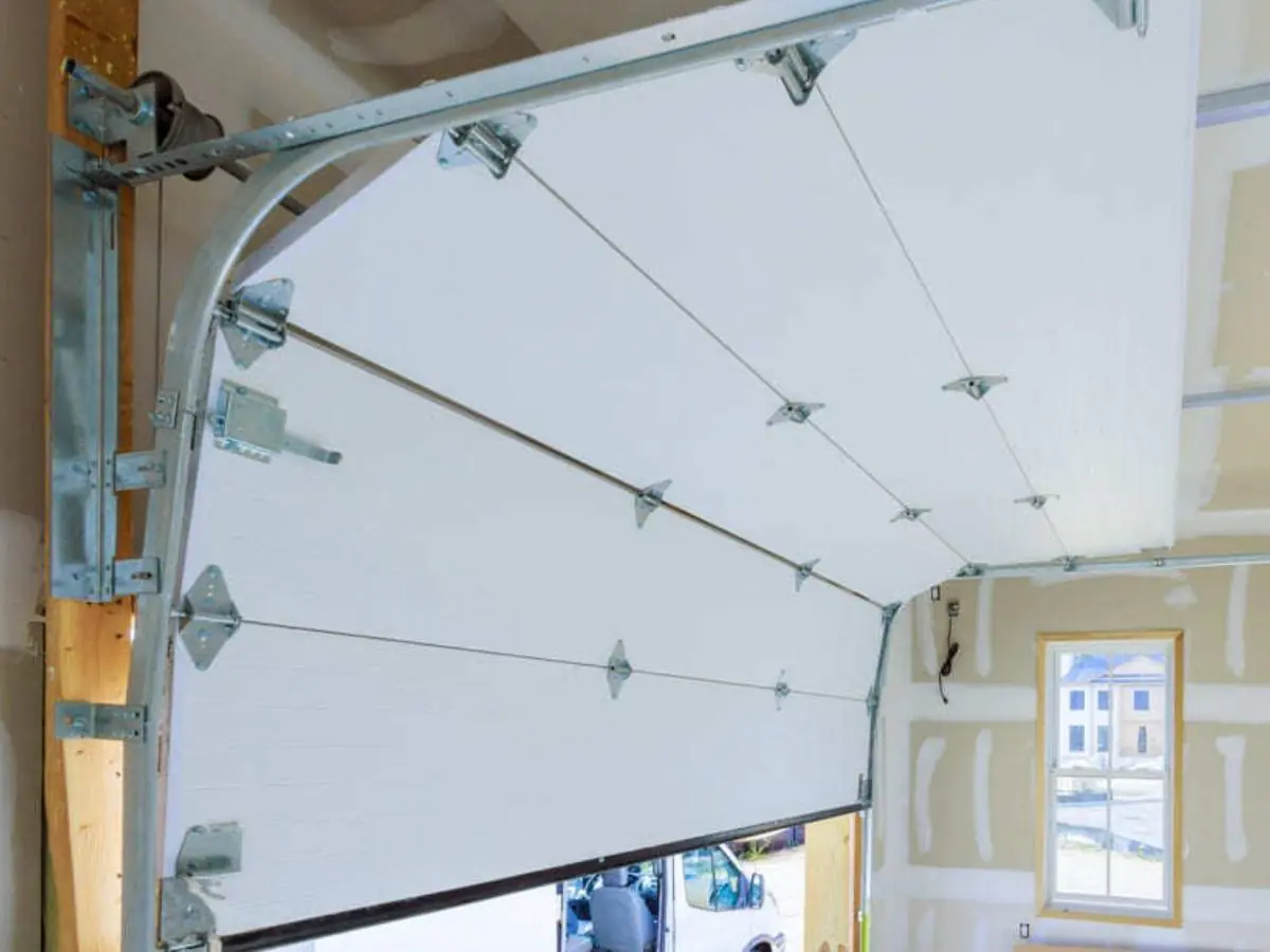 Changement câble porte sectionnelle 95470