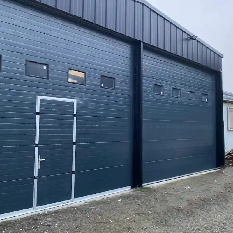 Réparation porte sectionnelle industrielle La Garenne Colombes