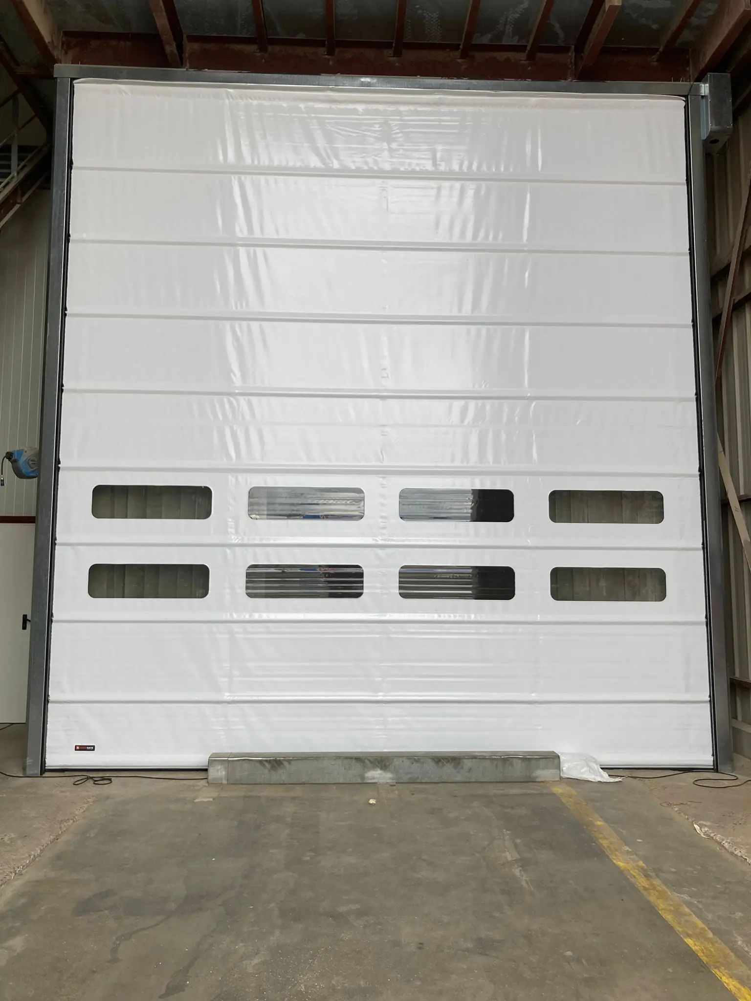 Réparation porte souple rapide à Magny-le-Hongre