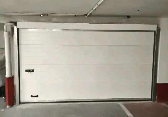 réparation porte de garage sectionnelle Maurecourt