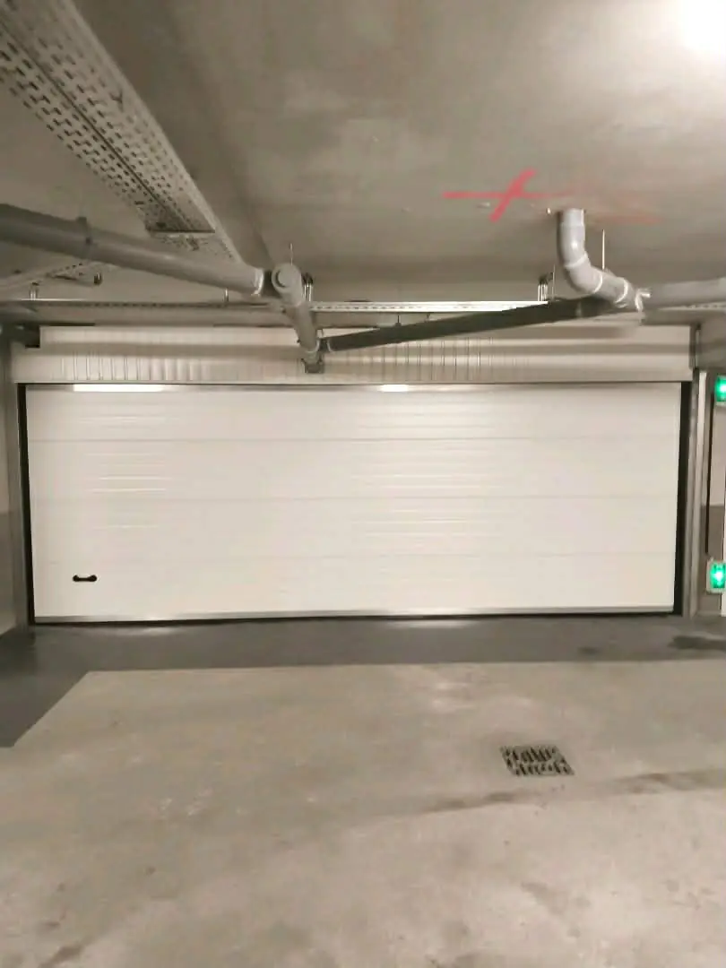 réparation de porte de garage sectionnelle Bailly