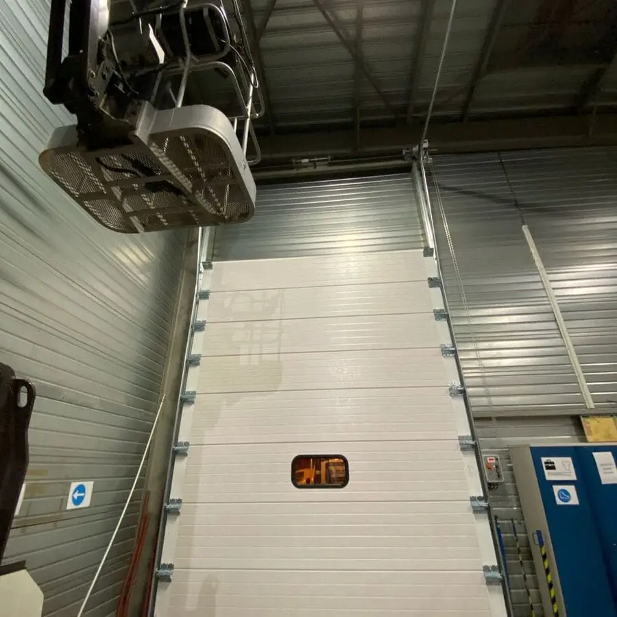 Dépannage porte sectionnelle industrielle Rubelles