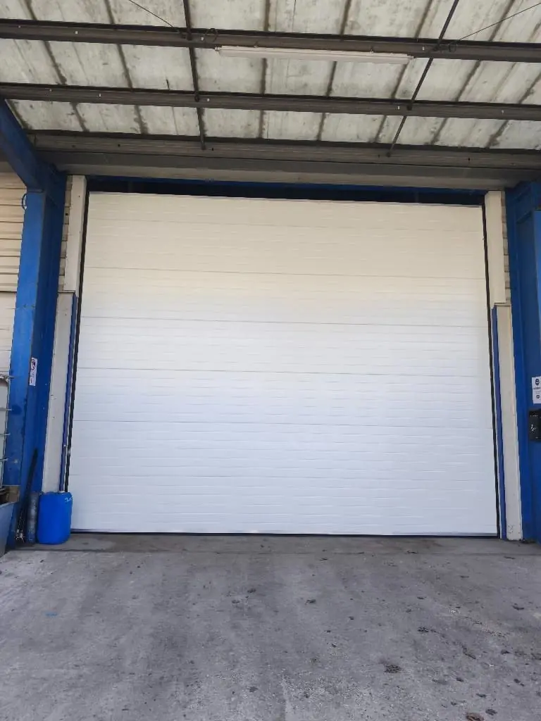 Réparation porte automatique industrielle Romainville