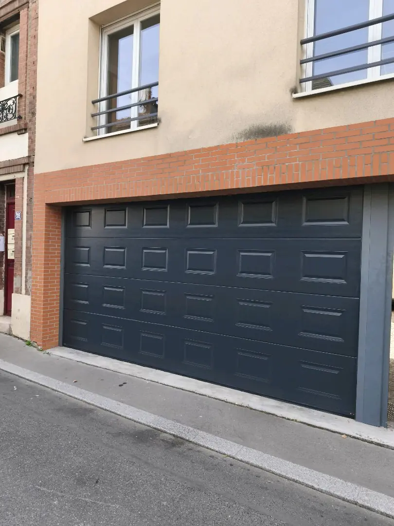 Réparation porte de garage collective 91