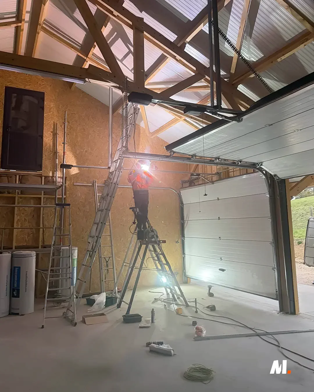 installation porte sectionnelle industrielle 78