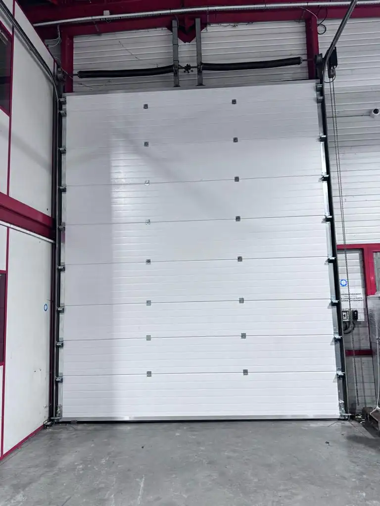 remise en service d'une porte sectionnelle industrielle