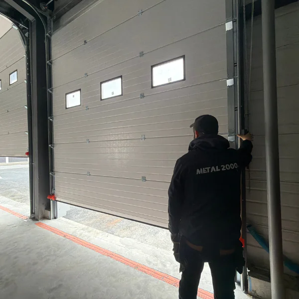 Réparation porte sectionnelle industrielle Égly 91520