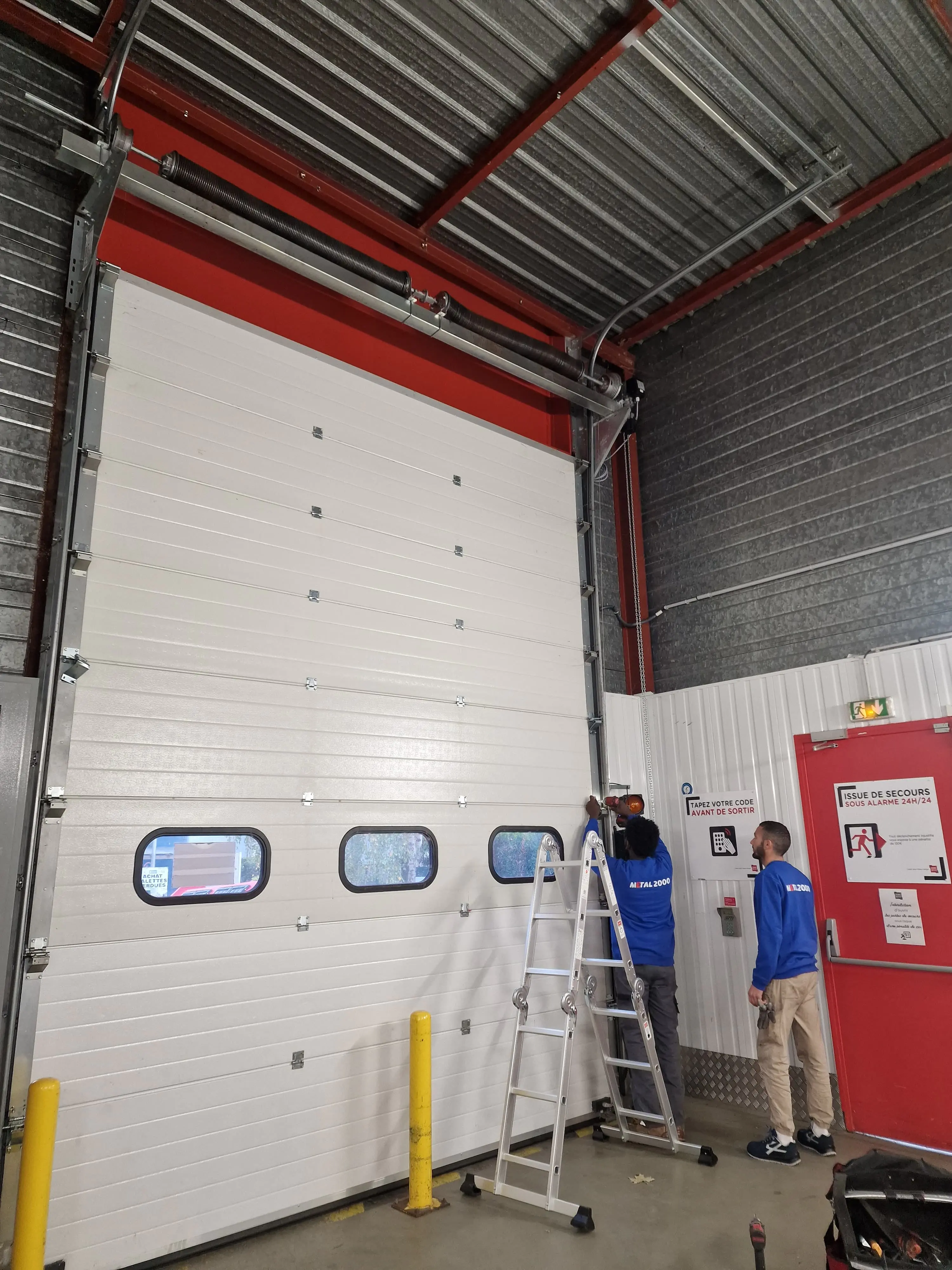 Dépannage porte sectionnelle industrielle Bailly (78870)