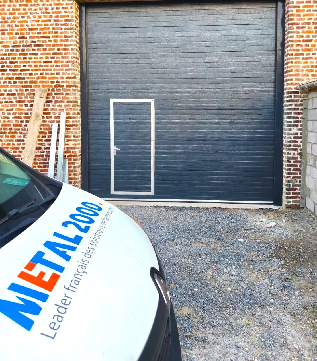 Remplacement panneau porte industrielle Ambérieu-en-Bugey