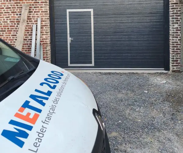 Réparation porte de garage sectionnelle 51