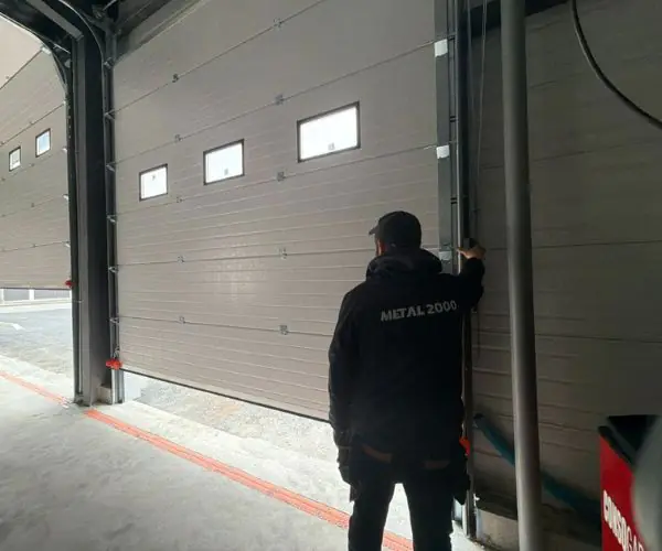 Réparation porte sectionnelle industrielle Reims 51100