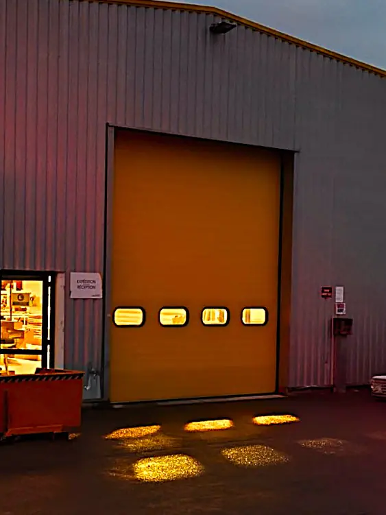 Réparation porte sectionnelle industrielle Corbas