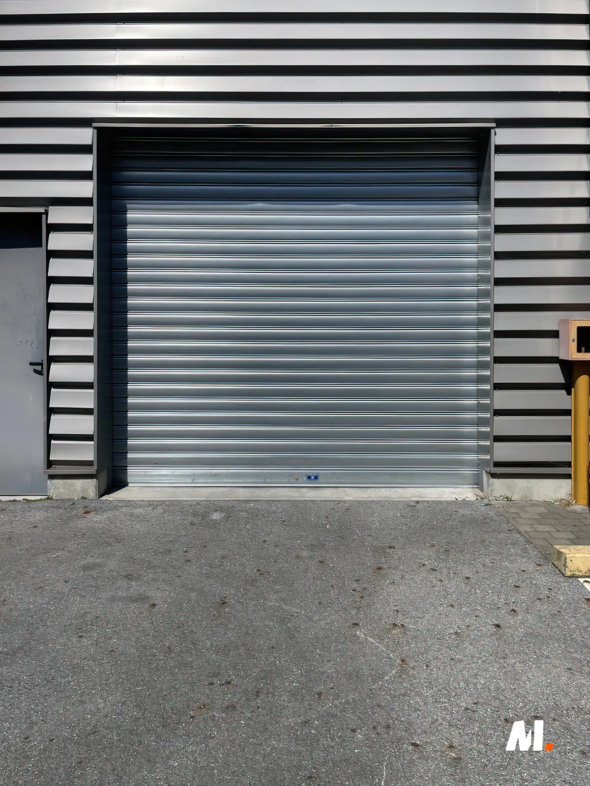 Rideau métallique industriel posé par METAL 2000