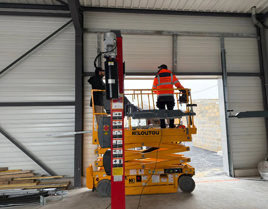 remise en état axe motorisé porte industrielle à Luzarches