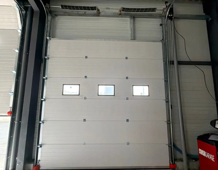 éparation porte sectionnelle industrielle Chevry-Cossigny