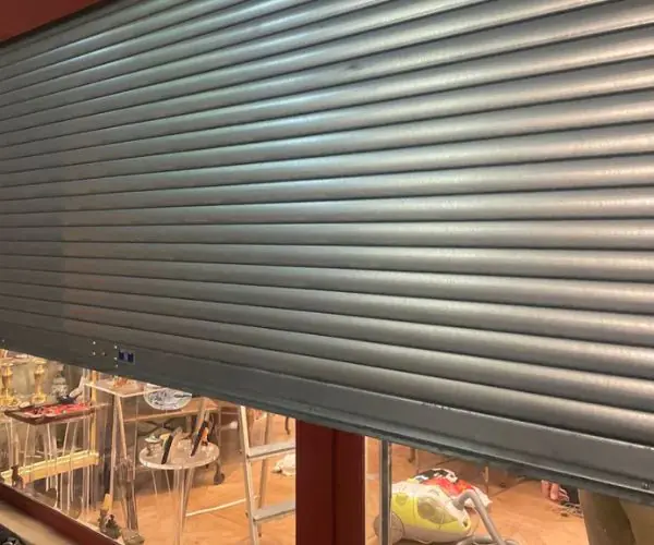 Dépannage rideau métallique coincé à Paris 14