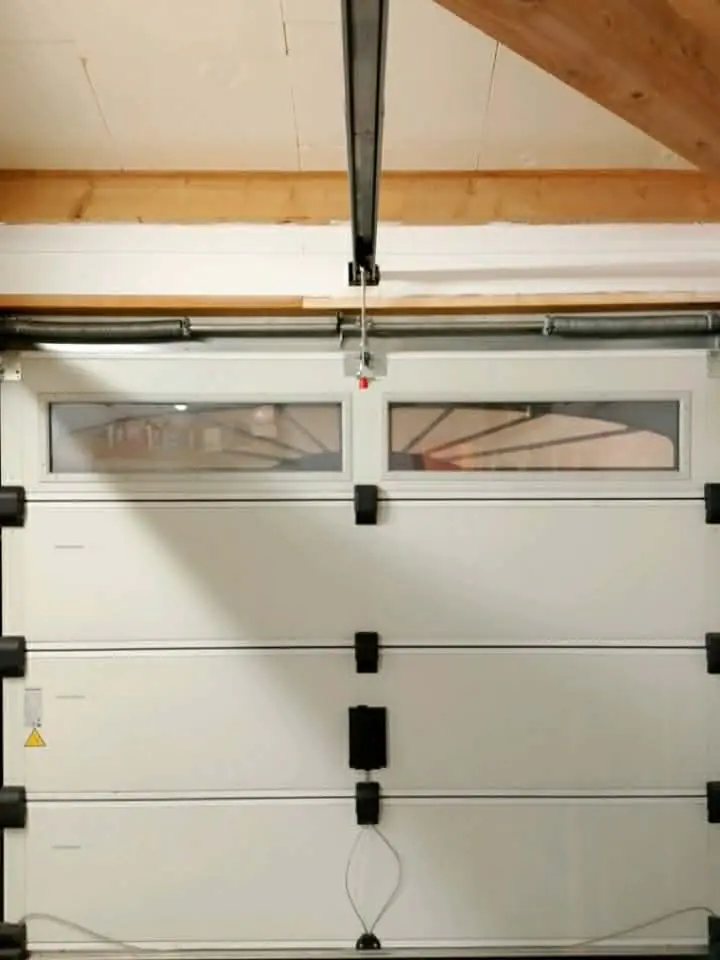 depose cable et ressort hs d'une porte de garage Warmeriville
