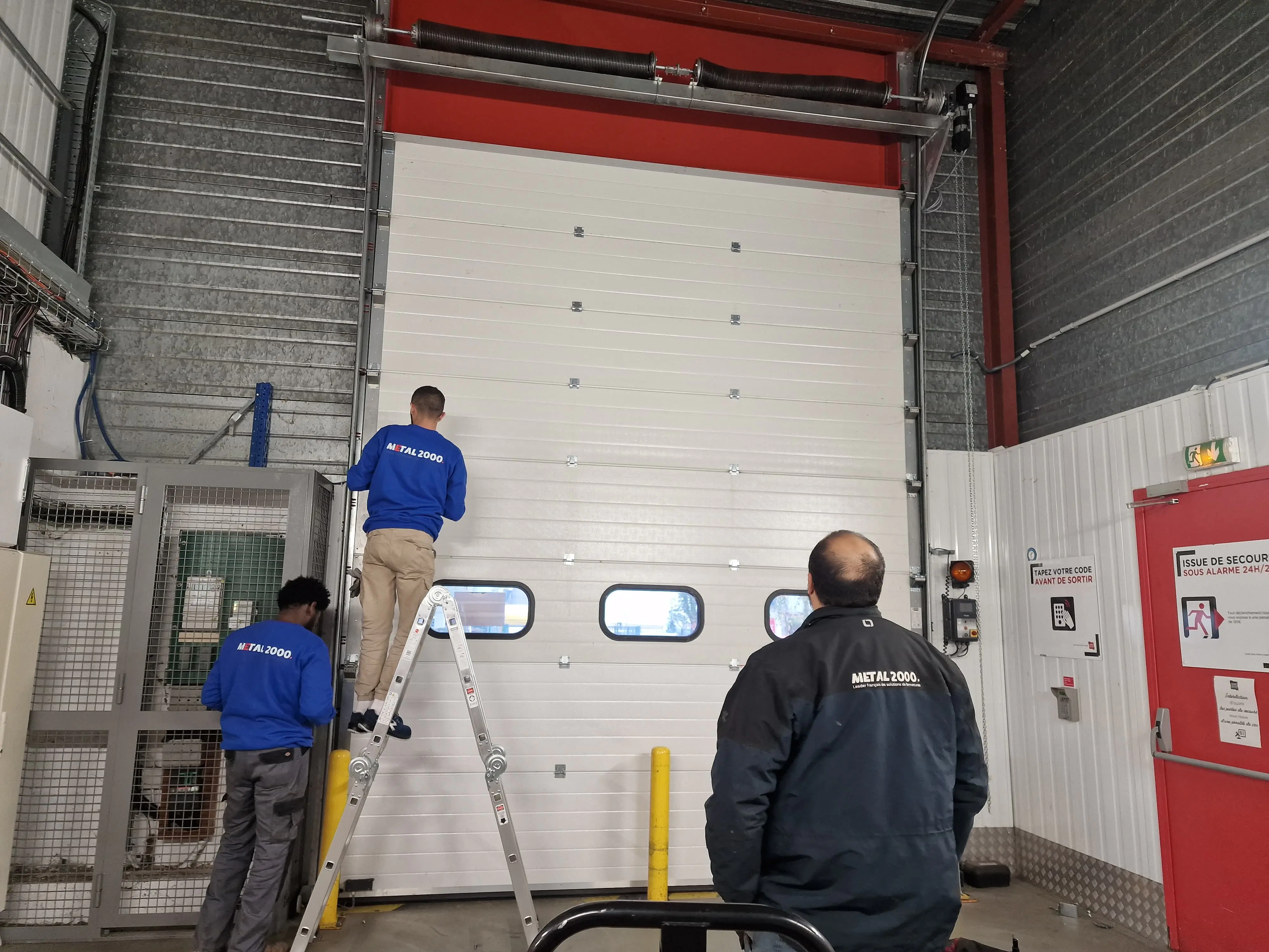 Réparation porte industrielle Tinqueux