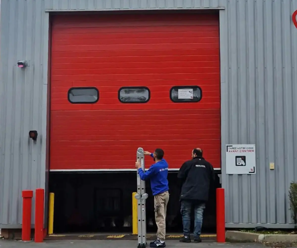 Réparation porte sectionnelle industrielle Cormicy