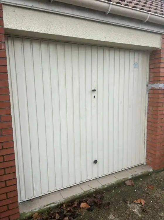 réparation porte de garage basculante à Warmeriville