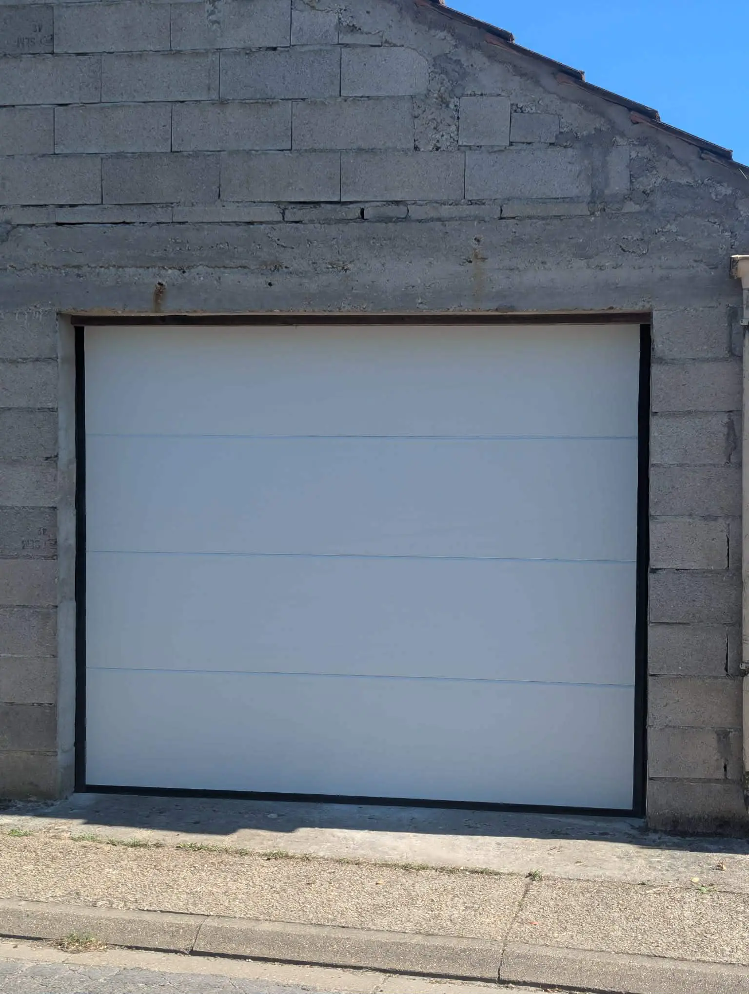 réparation porte de garage sectionnelle à Dormans