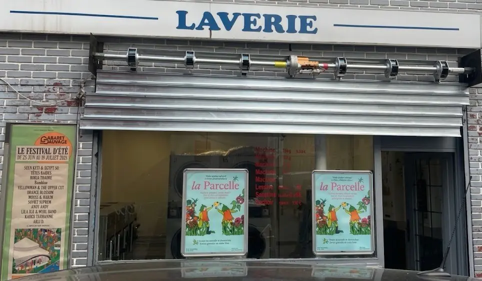 Chantier METAL 2000 Paris 19 Remplacement tablier rideau métallique pour Laverie rue de Tanger 75019