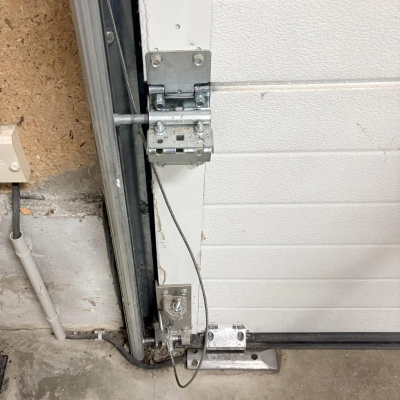 Remplacement cable porte sectionnelle industrielle safety protection 77
