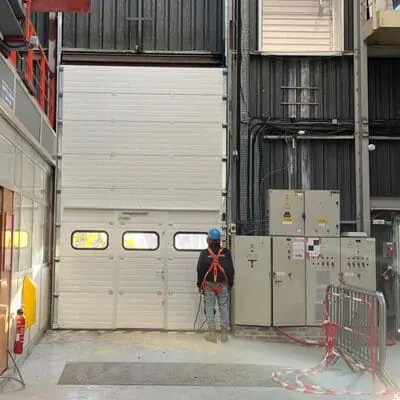 Réparation porte sectionnelle industrielle Firminy
