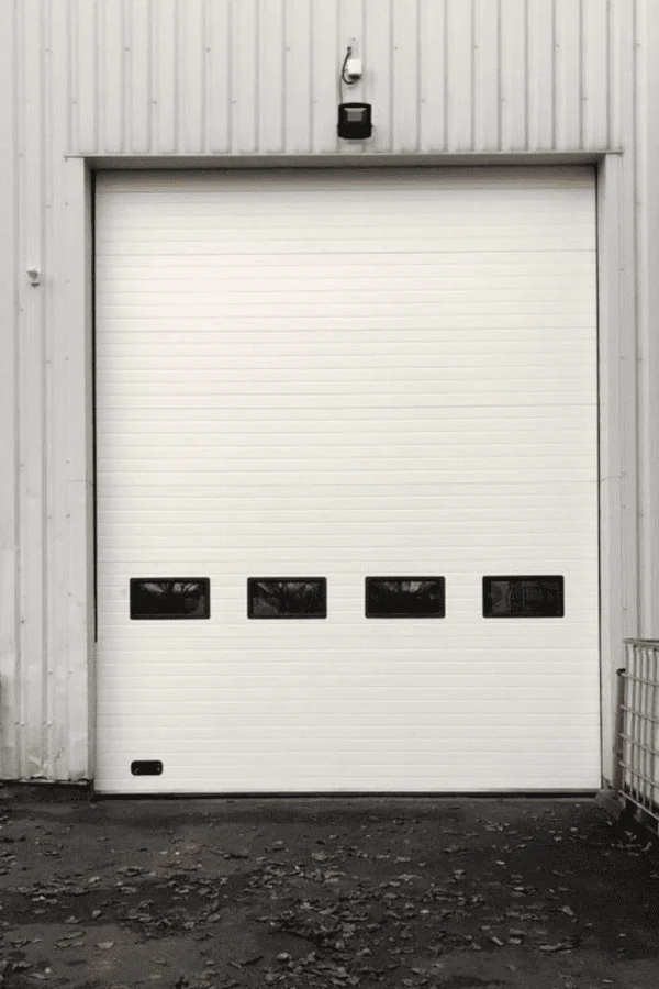 Réparation porte sectionnelle industrielle Pierry