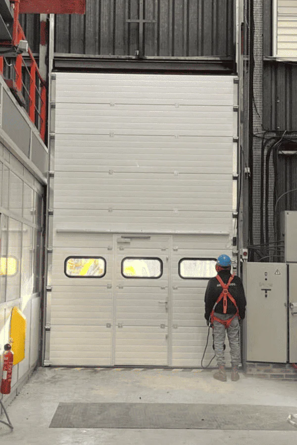 Réparation porte sectionnelle industrielle Taissy