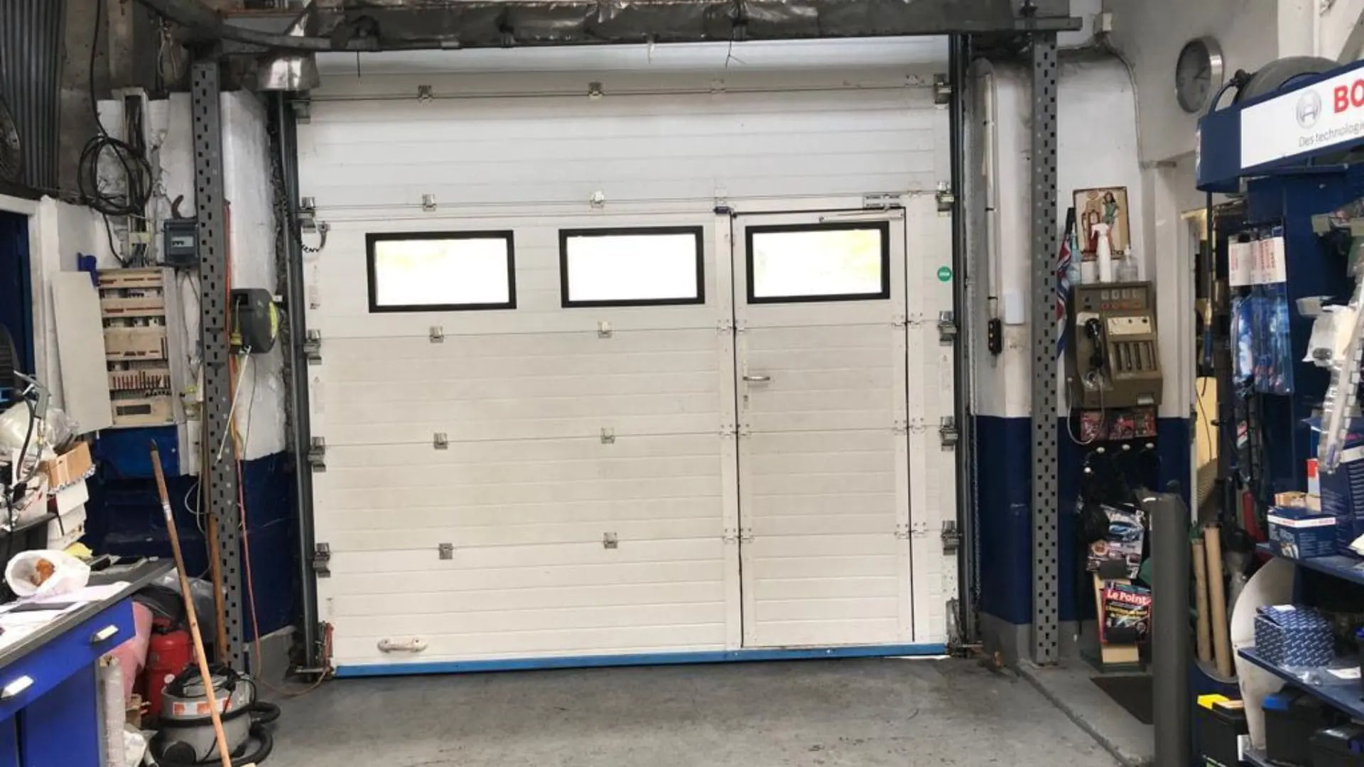 Réparation porte sectionnelle industrielle Frignicourt