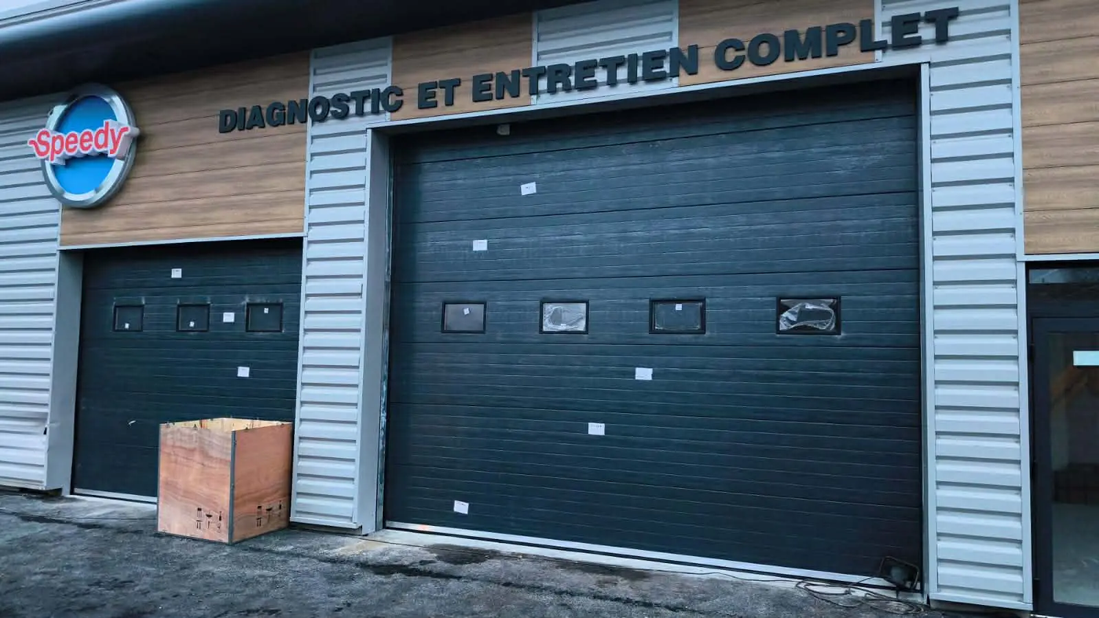 Réparation porte sectionnelle industrielle à Chennevières-sur-Marne