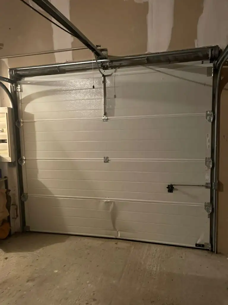 Diagnostic et déblocage d'une porte sectionnelle mourmelon-le-grand