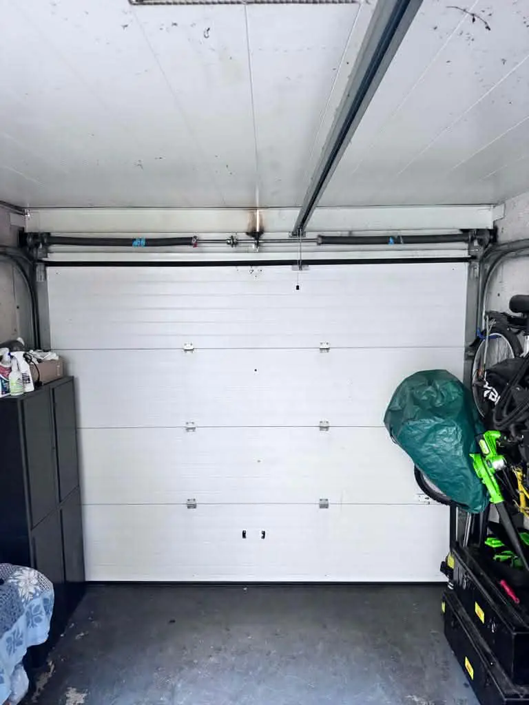 Remplacement d'une paire de ressorts de torsion, porte de garage sectionnelle-fere-champenoise
