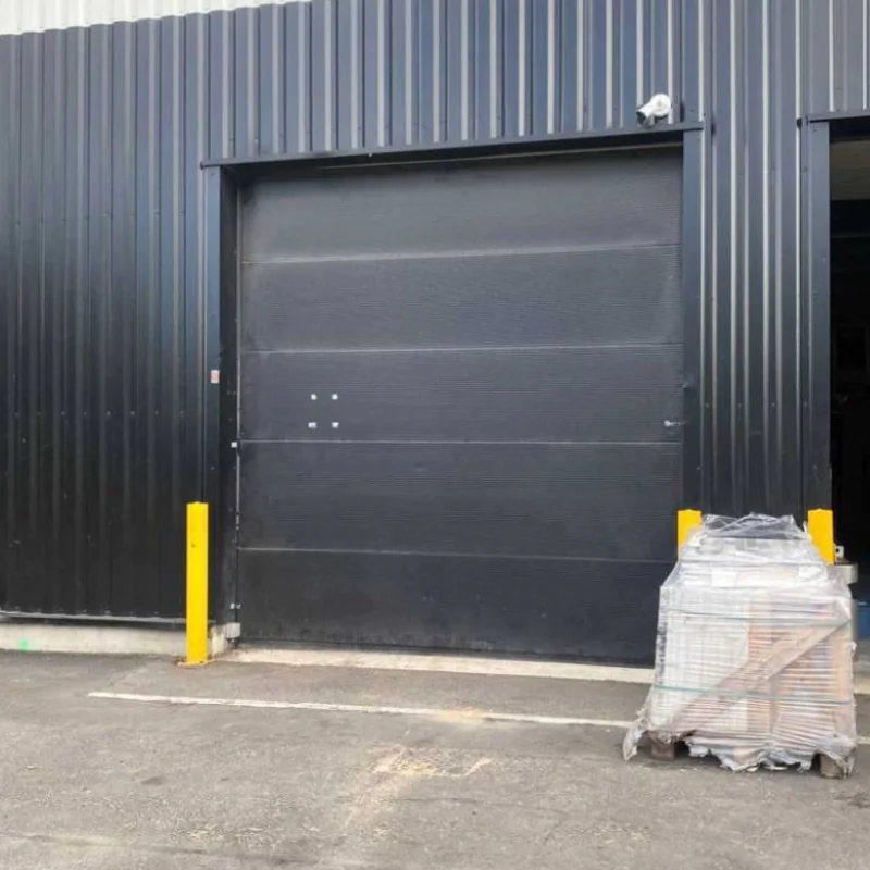Remplacement paire de câbles d’une porte sectionnelle industrielle pour W Motors (77)