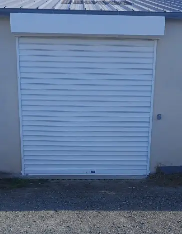 Remplacement porte de garage par un rideau métallique à lames pleines