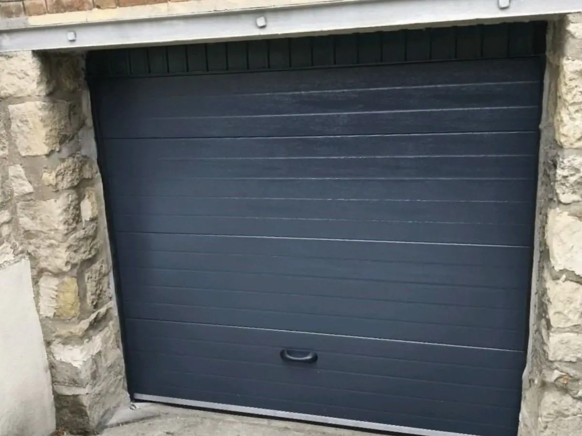 Réparation porte de garage sectionnelle Mardeuil (51530)