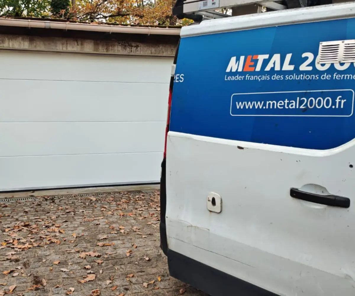 Réparation porte de garage sectionnelle Mardeuil
