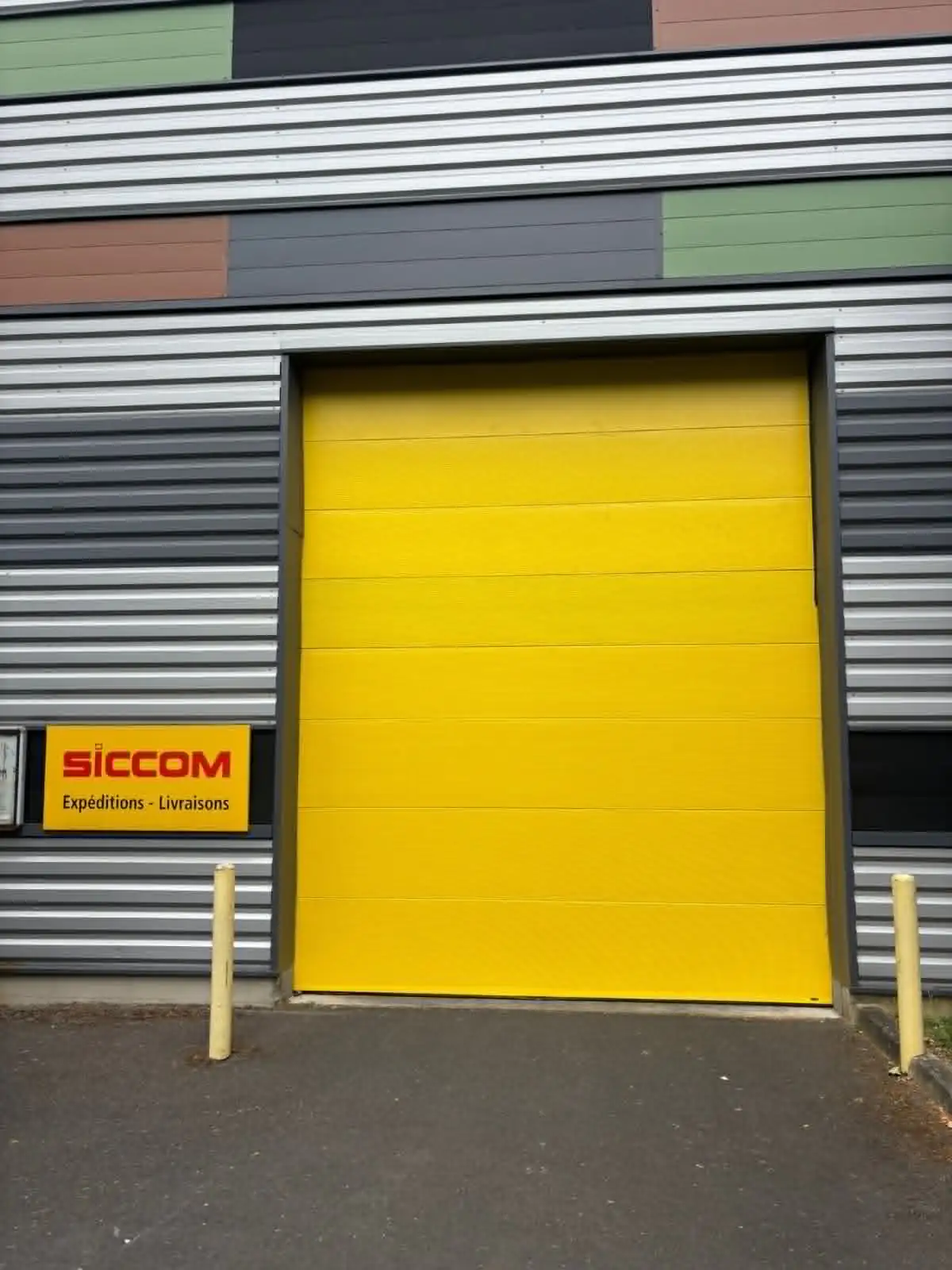 Réparation porte sectionnelle industrielle à Valenton