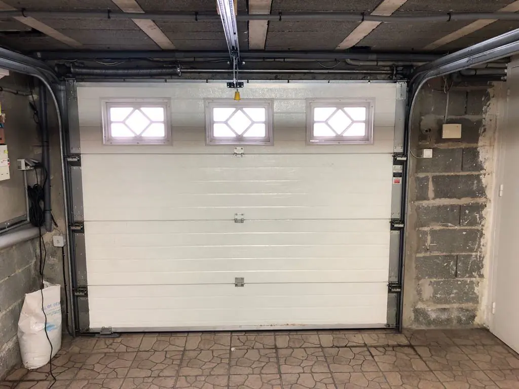 dépannage porte garage sectionnelle Couvrot
