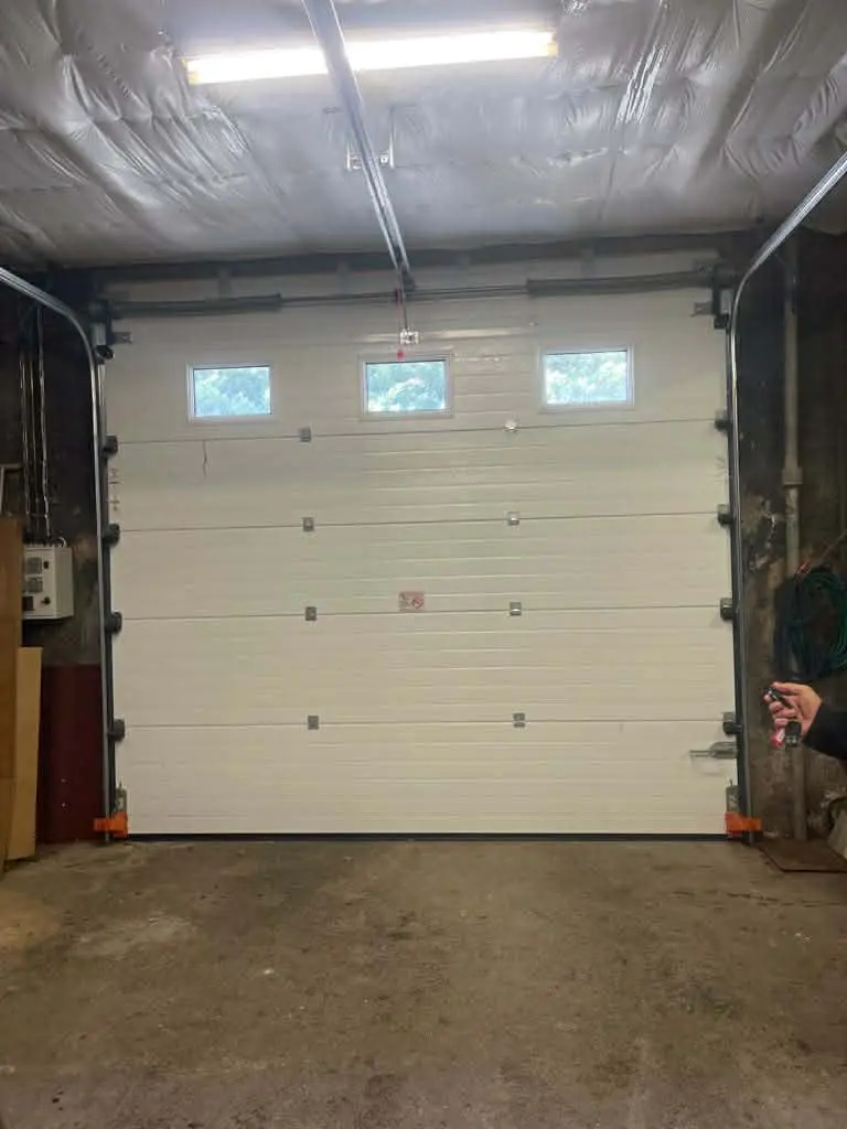 reglage tension de ressort porte de garage witry-les-reims