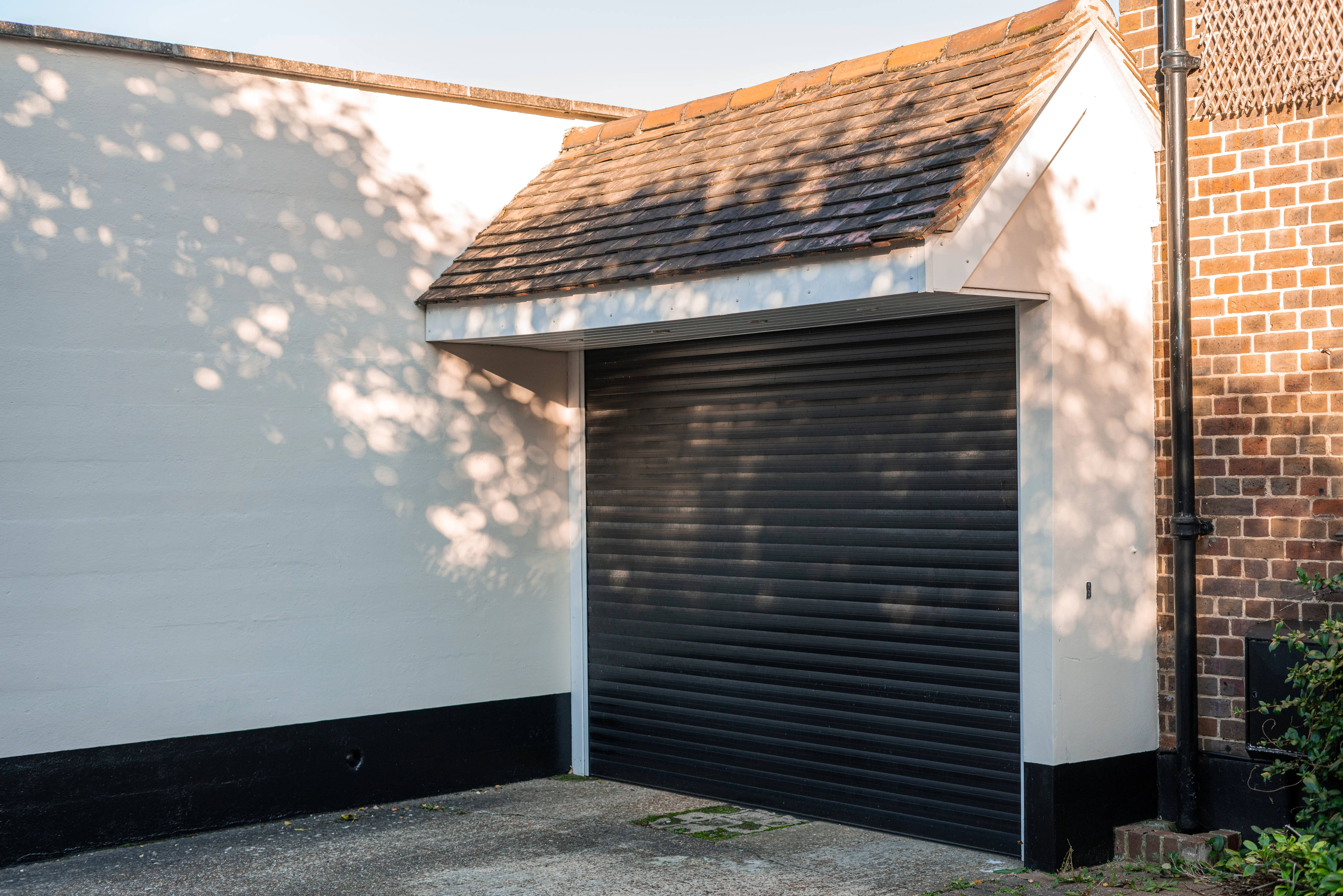 réparation porte de garage enroulable à Muizon