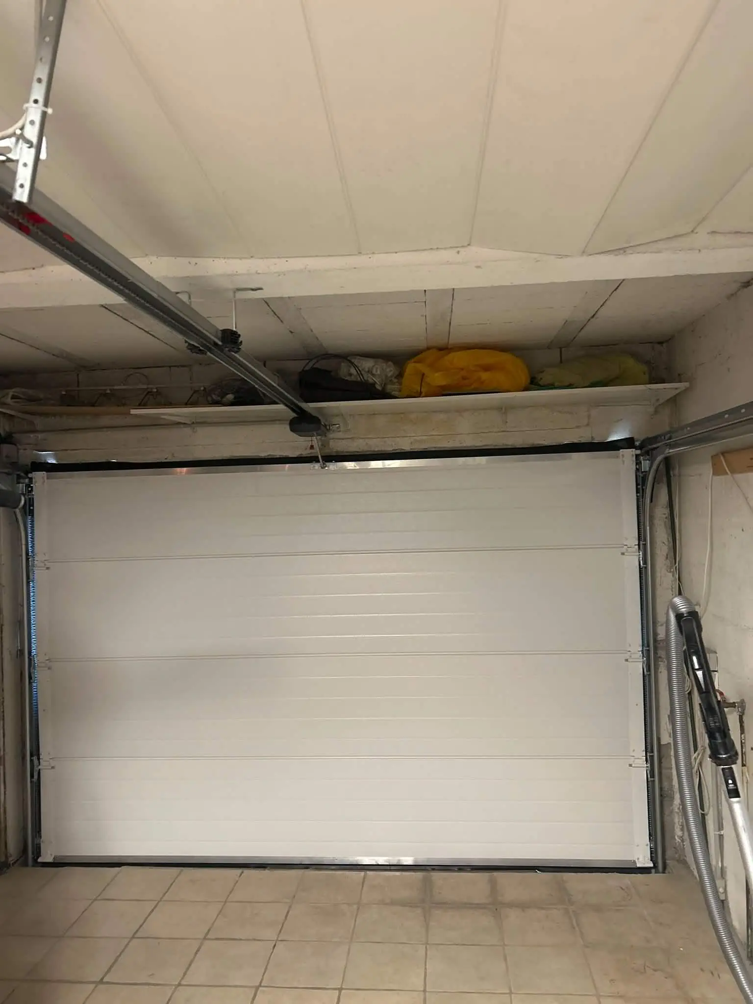 réparation de porte de garage sectionnelle à Bétheniville