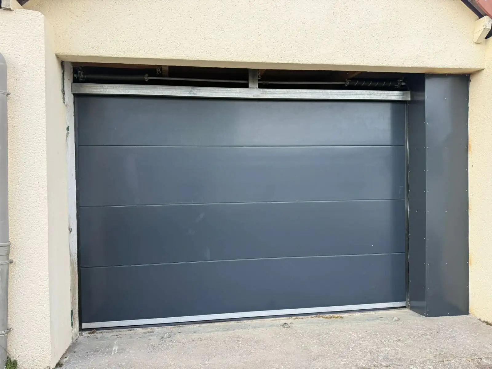  réparation porte de garage sectionnelle Saint-Léonard 